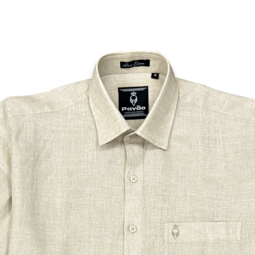 Beige shirt with a collar and visible brand label on a white background