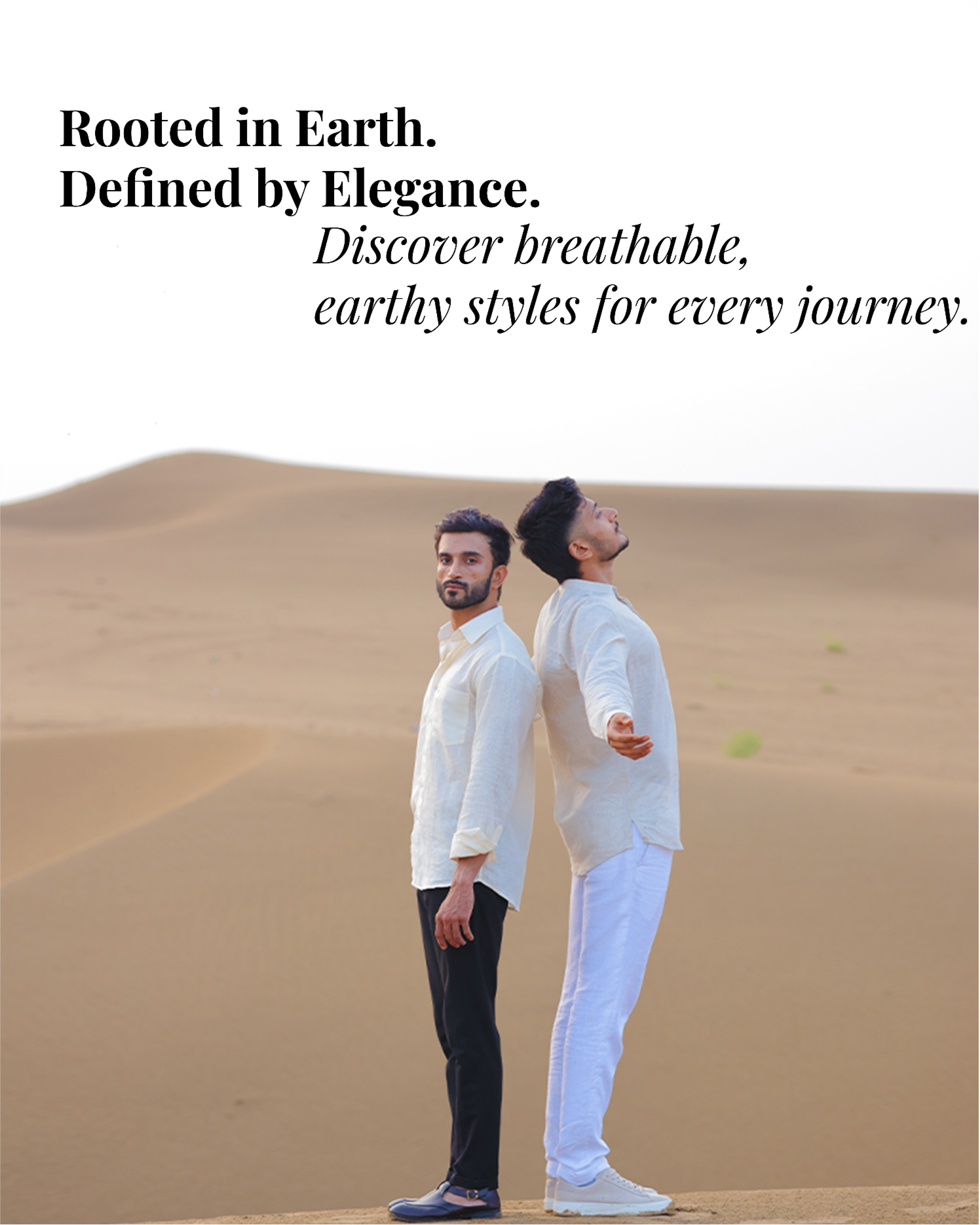 Two men standing on sand dunes with desert landscape, text about earthy styles.